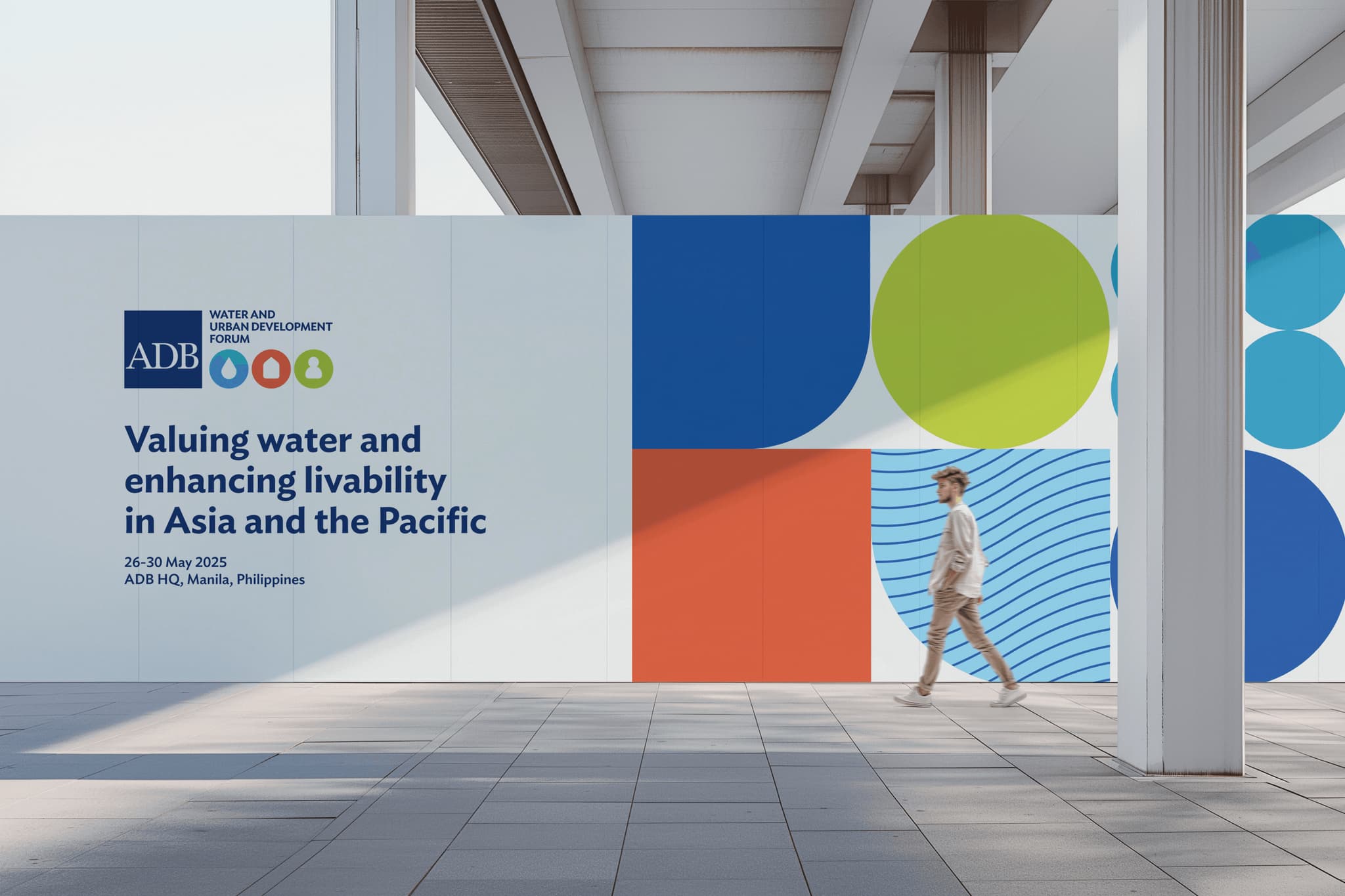Branded event wall showcasing the new visual identity for the ADB Water and Urban Development Forum 2025