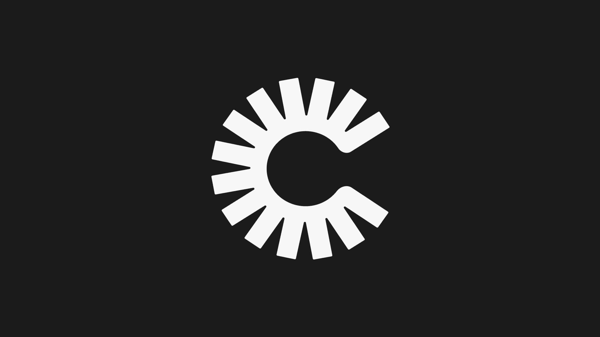 Stylized white "C" logo on a dark background, representing the brand identity of CDA.