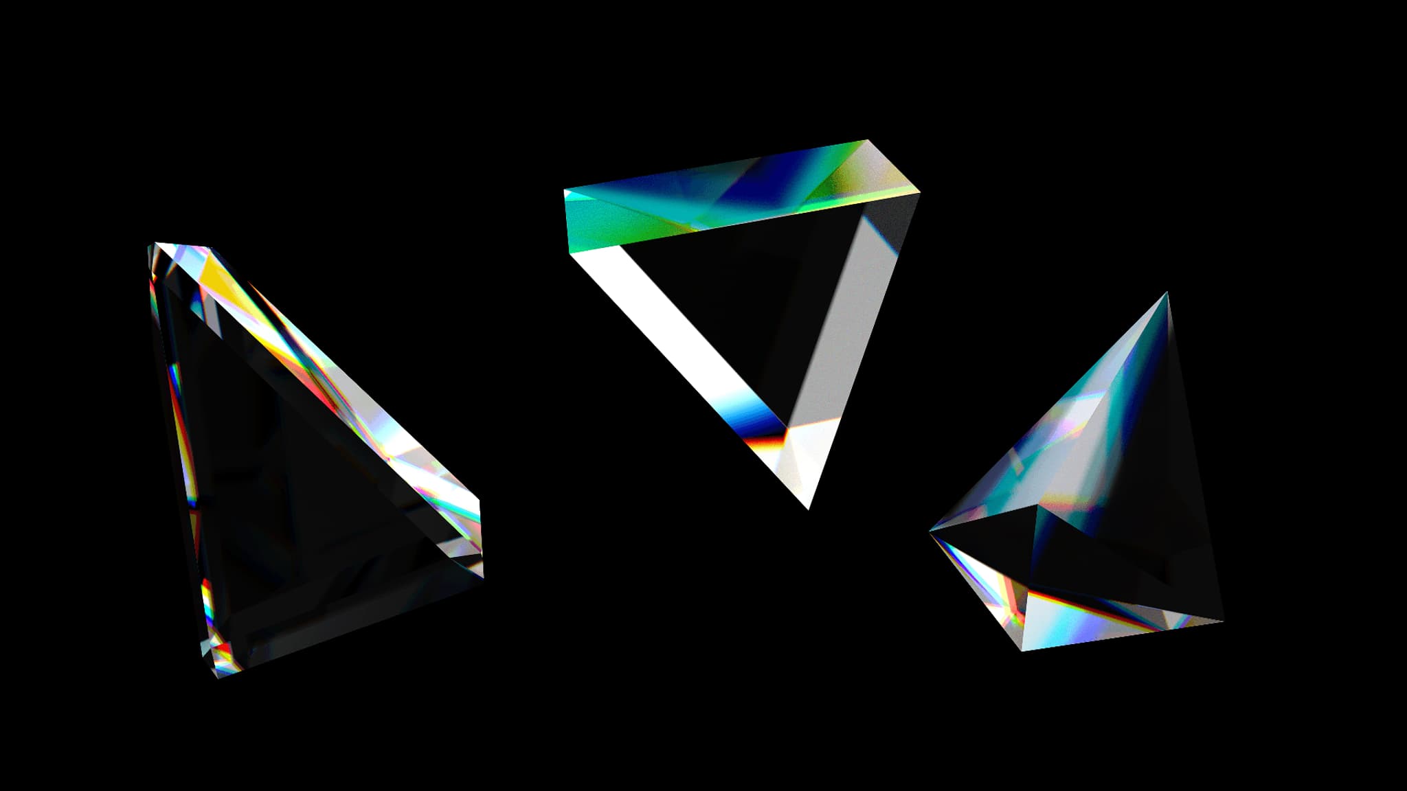 Colorful geometric prisms displaying vibrant light refractions against a black background. 