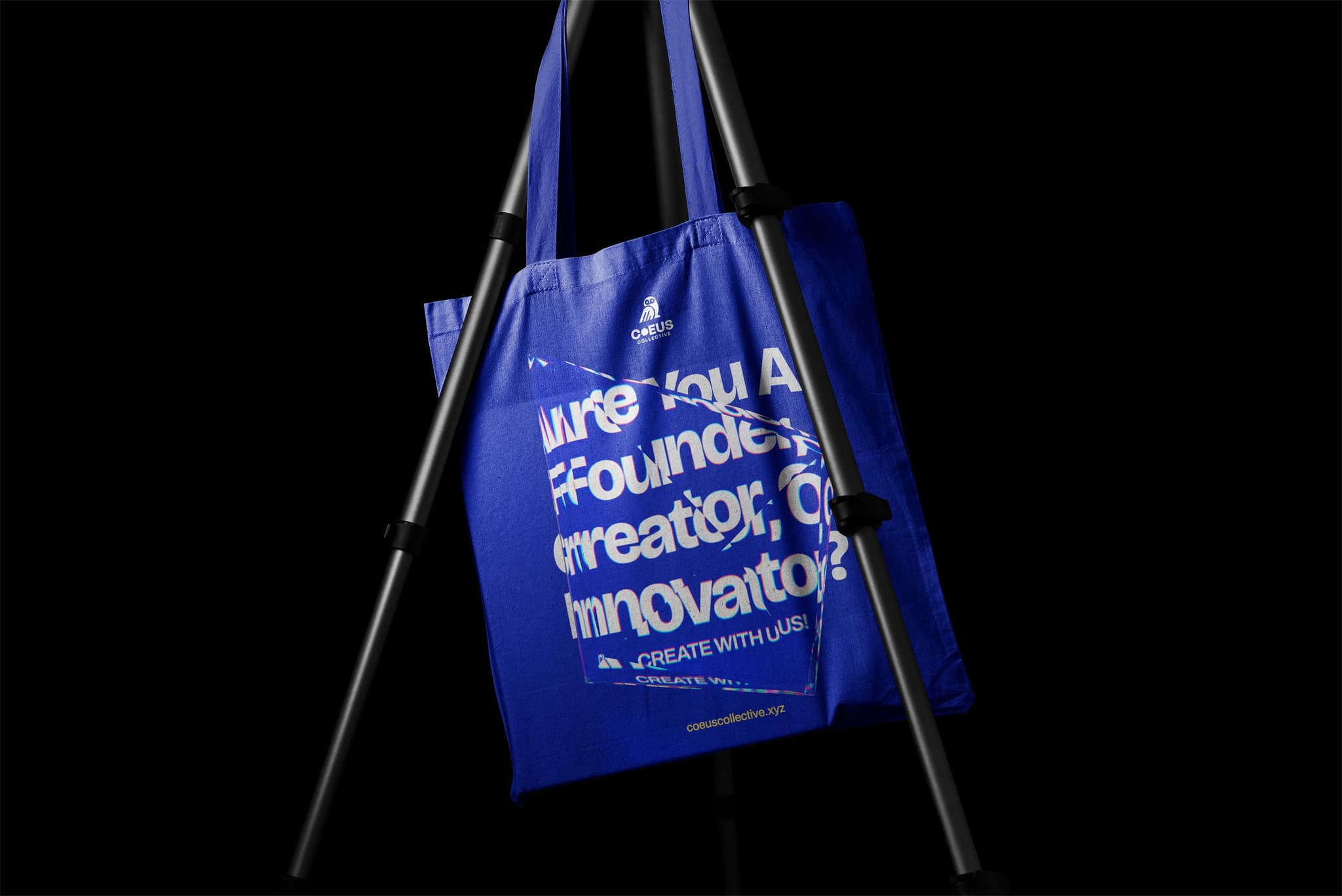 Blue tote bag featuring Coeus identity motifs with the text, "Are you a founder, creator, or innovator?"